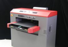 NSDS Demonstrating T Shirt Printing Solutions and Flatbed UV Printer at Sign Africa Cape Town Expo