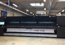 BS2i Targets Textile Printing And Backlit Graphics Markets With EFI VUTEk EFI VUTEk 5r+ LED drives value in high volume work.