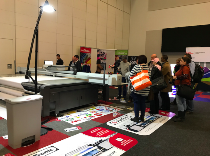 Signtronic Demonstrating The Nyala Flatbed Printer At The Cape Town Sign Africa Expo